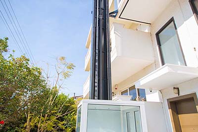 Installation of an outdoor hydraulic liftασανσερ